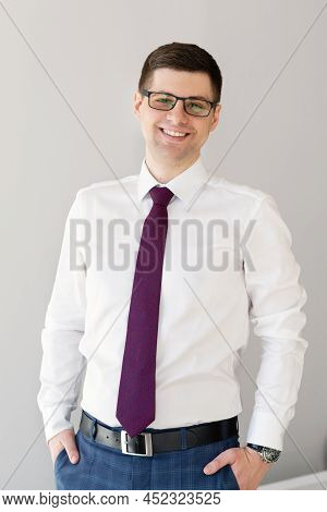 Portrait Of A Male Freelancer. Decentralized Work Of Digital Nomads, Hybrid Work Model.