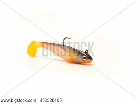 Single Jig Head Shad Soft Fishing Lure With Hook And Paddle Tail Swimbaits Isolated On White Backgro