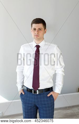 Portrait Of A Male Freelancer. Decentralized Work Of Digital Nomads, Hybrid Work Model.