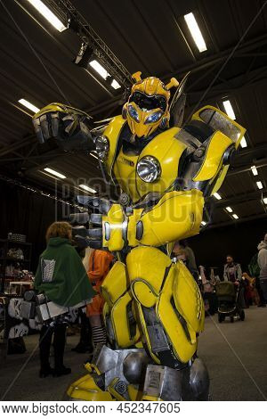 Doncaster, Yorkshire, England- April 3, 2022. Bumblebee Cosplay Looking At The Camera At The Doncast