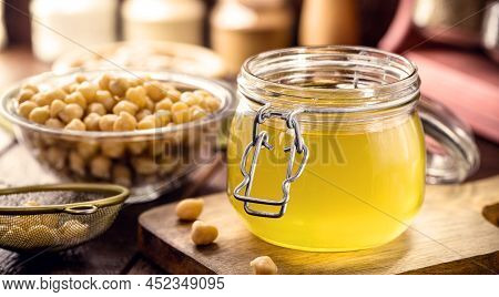 Aquafaba In A Kitchen Pot, Compote With Organic Chickpea Legume Water, Used As A Vegan Alternative