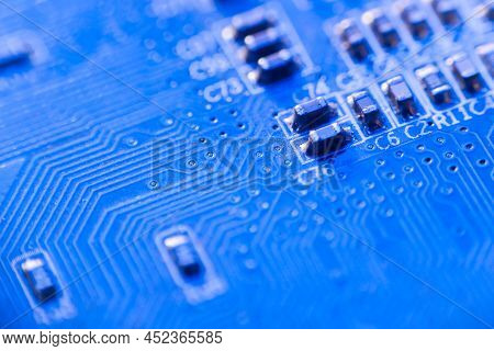 Computer Microchips And Processors On Electronic Circuit Board. Computer Hardware Technology. Abstra