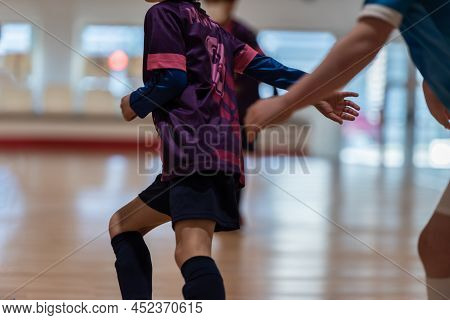 A Player Escapes Her Opponent Dribble In A Regional Game