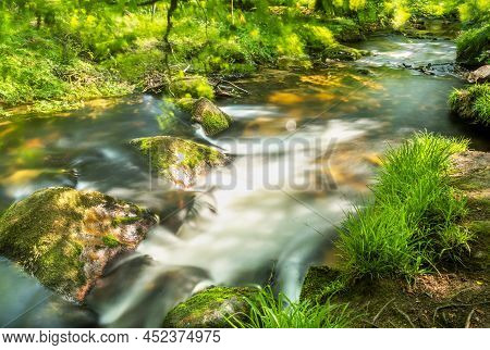 Golitha Falls,summertime Rocks And Flowing Waters,liskeard,cornwall,england,uk