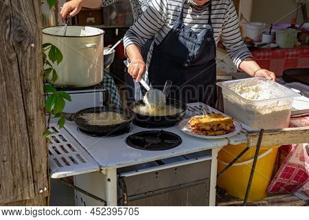 Making Traditional Old Style Deep Fried Poteto Tocsni Rosti Hash Brown In A Hungarian Agriculture Fa