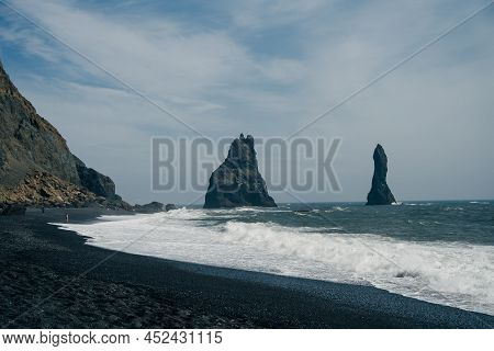The Black Sand Beach Of Reynisfjara And The Mount Reynisfjall From The Dyrholaey Promontory In The S