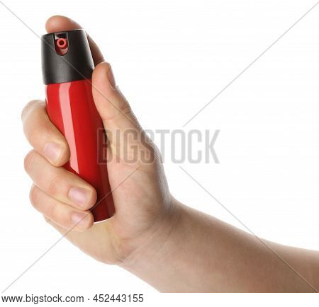 Man Holding Pepper Spray On White Background, Closeup