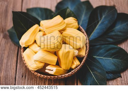 Ripe Jackfruit Peeled Tropical Fruit Fresh From Jackfruit Tree, Jackfruit On Wooden With Leaf Backgr