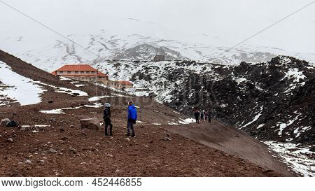 Cotopaxi, Ecuador-march 19, 2022: Tourists Coming Down Of The Volcano Cotopaxi From The Refuge Locat