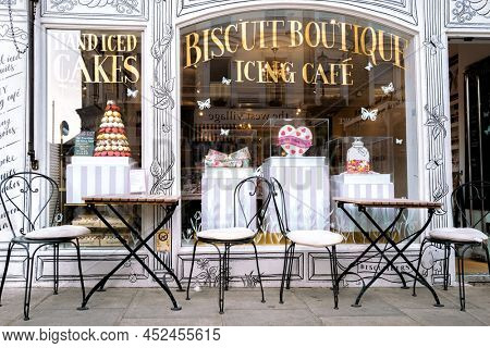London, UK - 24 March 2022: The quaint Biscuit Boutique and Icing Cafe, Notting Hill, London. An upmarket bisuiteers in Notting Hill, selling sweet treats.