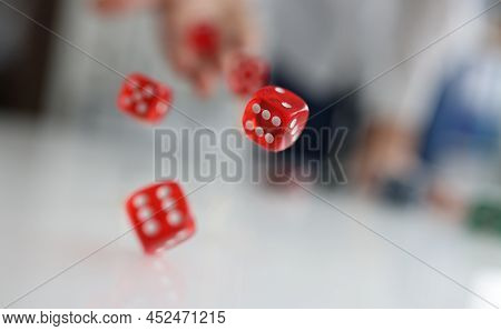 Woman Hand Throws Red Dice Into Air. Good Luck Gambling Bet Risk Luck Win Concept