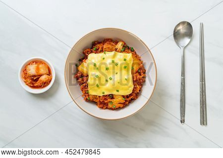 Kimchi Fried Rice With Pork And Topped Cheese