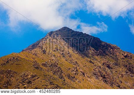 Summit Of Imlil Mountain In Morocco With Clouds Shadow