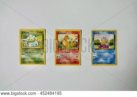 Prague, Czech Republic - April 3 2022: Bulbasaur, Charmander And Squirtle Pokemon Cards Front. The P