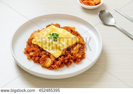 Kimchi Fried Rice With Pork And Topped Cheese