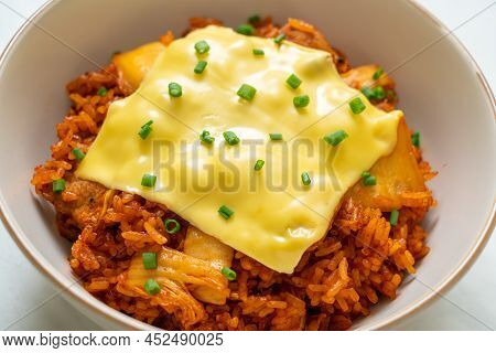 Kimchi Fried Rice With Pork And Topped Cheese