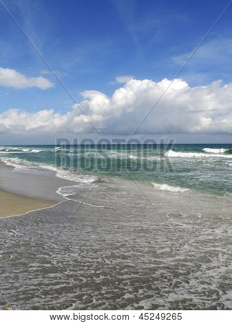 Rolling Waves Wash Up On the Beach
