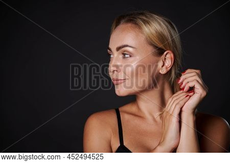 Attractive Stunning Well-groomed Young Caucasian Pretty Woman With Blond Hair, Radiant Healthy Tanne