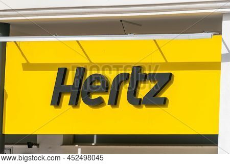 Paphos, Cyprus - April 2, 2022: Logo And Sign Of Hertz Corporation, A Subsidiary Of Hertz Global Hol