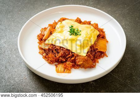 Kimchi Fried Rice With Pork And Topped Cheese