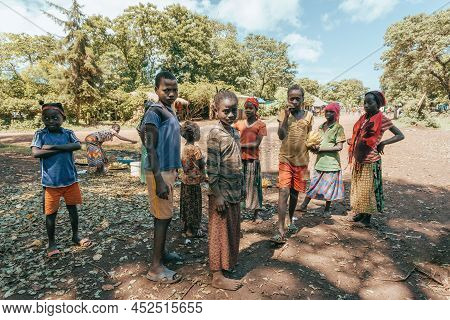 Cure - Jinka, Omo River Valley, Ethiopia - May 10, 2019: Portrait Of Happy Teenagers In Cure Near Ci