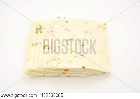 Pepper Jack Cheese Slices Isolated Over A White Background