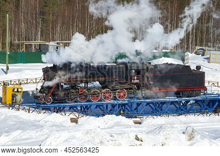 Ruskeala, Russia - March 10, 2021: The Old Soviet Steam Locomotive L-2198 Turns Around On A Turning 