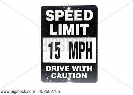 Speed Limit Sign. Speed Limit 15 MPG Drive with Caution Metal Reflective Sign. Old vintage speed limit road sign. isolated on white. 