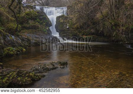 Epic Landscape Image Of Aira Force Upper Falls In Lake District During Colorful Autumn Showing