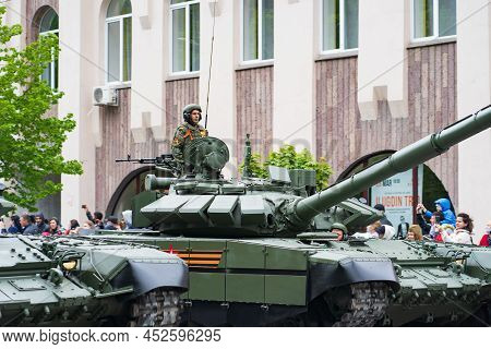 T-72b3 Tanks. Military Equipment Drives Through The Streets Of The City.