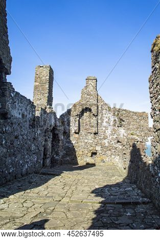 Bushmills, Northern Ireland, March 18, 2022. The Inner Structure Of Dunluce Castle Ruins In A Sunny 