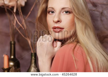 elegant sensual young woman in red dress