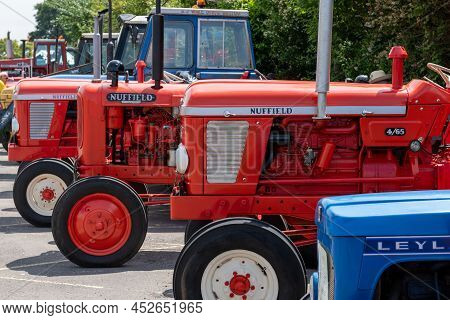 Honiton.devon.united Kingdom.july 2nd 2021.a Row Of Nuffield Tractors Is On Display At The Devon Cou