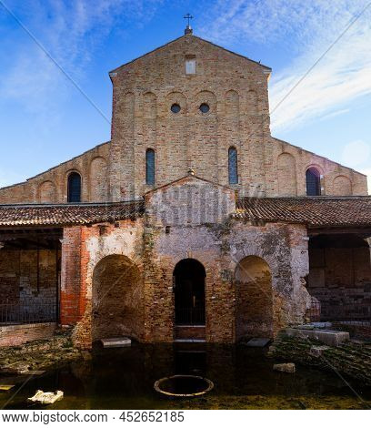 Facade Of The Church Of Santa Maria Assunta Or Basilica Of Santa Maria Assunta, Torcello, Venice. It