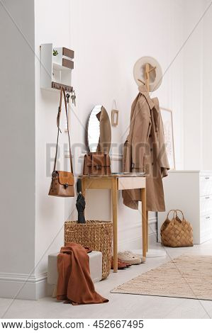 Modern Hallway Interior With Stylish Dressing Table And Key Holder