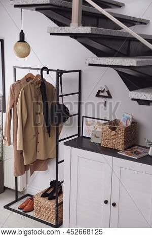 Modern Hallway Interior With Stylish Furniture And Key Holder