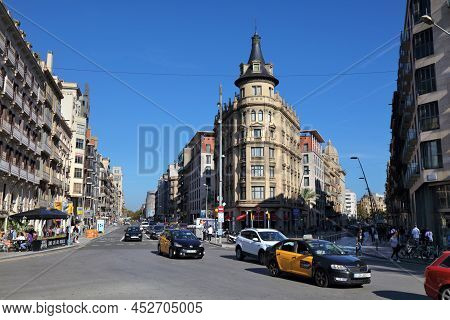 Barcelona, Spain - October 7, 2021: Traffic In Eixample District In Barcelona, Spain. Barcelona Is T