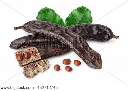 Ripe Carob Pods And Bean Isolated On White Background With Clipping Path And Full Depth Of Field