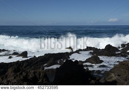 View On Black Lava Rocks In Small Village Punta Brava Near Puerto De La Cruz, Tenerife, Canary Islan