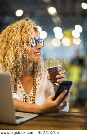 Travel Job And Smart Working Concept Lifestyle With  Young Adult Pretty Woman Use Phone And Laptopco