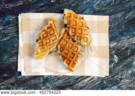 Croffle With Chocolate. A Popular Dish Is A Hybrid Of Croissant And Waffle. Black Background