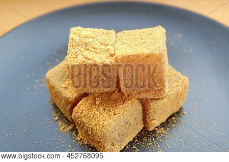 Closeup A Plate Of Delectable Warabimochi, Soft And Chewy Japanese Traditional Confection