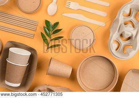 Eco-friendly Tableware - Kraft Paper Utensils On Orange Background. Street Food Paper Packaging, Rec