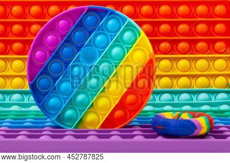Trendy Pop It Fidget Toys, Close-up. Popular Silicone Colorful Anti Stress Pop It Toy For Child.
