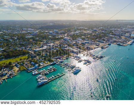 Nassau downtown aerial view and Nassau Cruise Port in Nassau Harbour on New Providence Island, Bahamas.