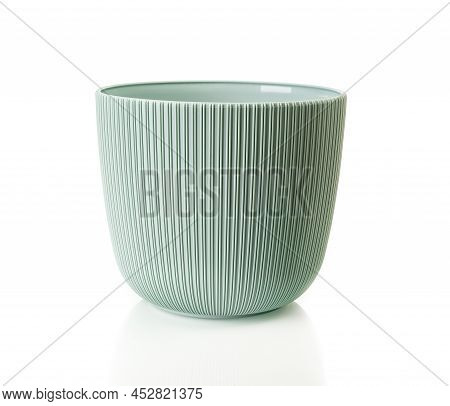 Empty Flower Pot Isolated On A White Background. Decorative Plant Pot Cutout. Greenish Gray Plastic 