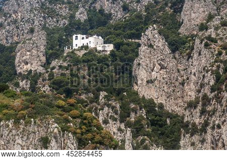White House On The Edge Of A Cliff