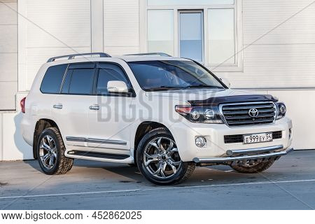 Novosibirsk, Russia - 04. 12. 2022: Front View Of Toyota Land Cruiser 200 J200 2013 Year White Color