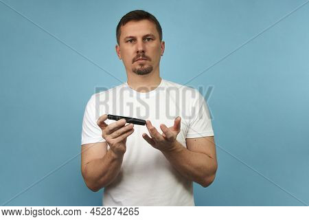 Man With Lancet Pen Doing Diabetes Test, Close-up