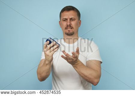 Man Checking Blood Sugar Level With Glucometer.